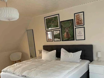 Bergstadthütte in Bad Grund - Schlafzimmer oben mit französischem Bett