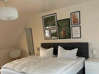 Bergstadthütte in Bad Grund - Schlafzimmer oben mit französischem Bett Bergstadthütte in Bad Grund - Schlafzimmer oben mit französischem Bett