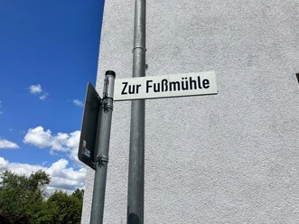 Straßenschild zur Fußmühle