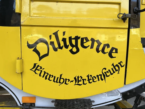 Aufschrift Postkutsche