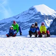Family on sledding route
