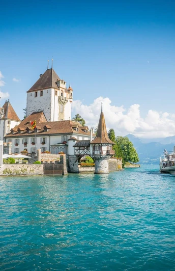 Oberhofen Castle with steamship Blümlisalp, Oberhofen on Lake Thun