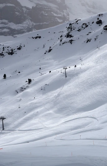 Sur le parcours de randonnée hivernale du Männlichen à la Kleine Scheidegg.