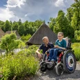 En déplacement avec le fauteuil roulant électrique JST-Mountain Drive sur le parcours Ballenberg «a la Cart»