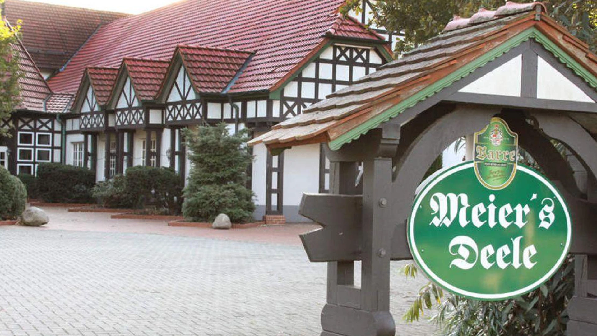Meiers Deele Traditional half-timbered house with red tiled roof in Stemwede, sign shows lettering "Meier's Deele".