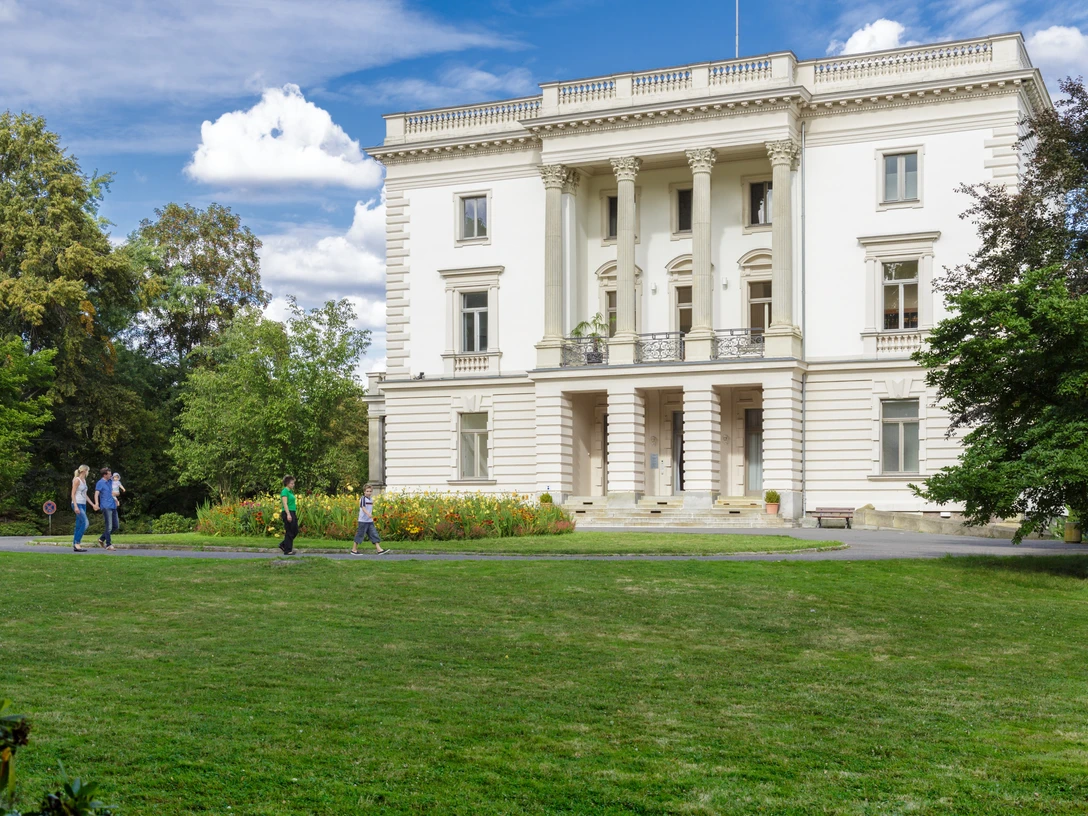 White House in Markkleeberg - Sights in the Leipzig Region View of the neoclassical White House in Markkleeberg with green meadow and blue sky, region, nature, leisure, spring